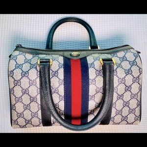 Authentic Gucci Navy Monogram Supreme Canvas purse